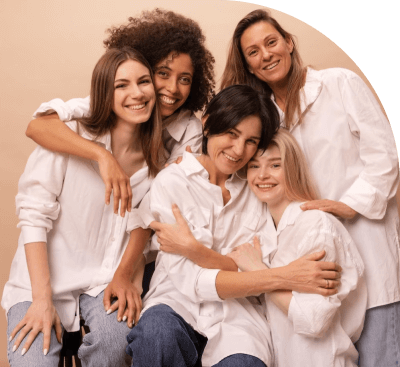 four women smiling